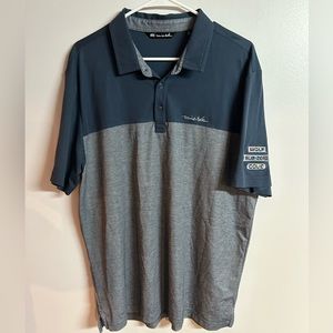 Travis Mathew golf shirt.